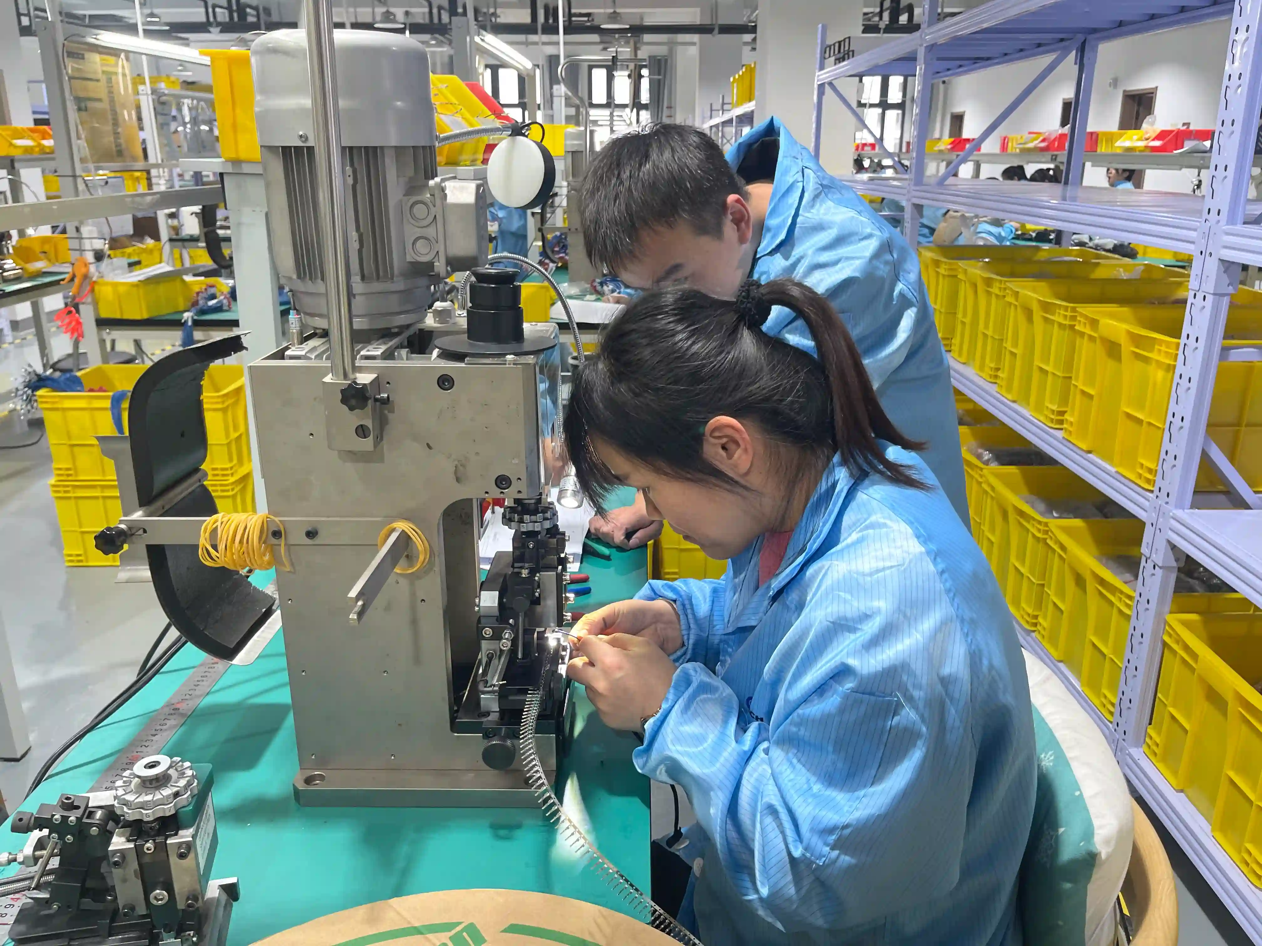 Automated terminal crimping machine in wire harness factory